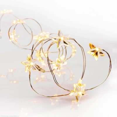 Immagine di hellum 525045 Catena luminosa a LED con 20 LED, luce bianca calda, 95 cm, lunghezza 30 cavo di alimentazione, timer, stelle, motivo natalizio, 3 batterie AA (non incluse)