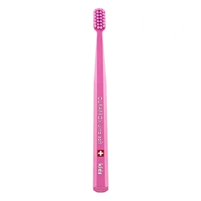 Immagine di Curaprox CS Kids Spazzolino da denti manuale per bambini con setole ultra morbide 5500 e testina piccola, colore: Rosa