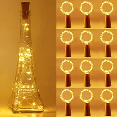 Immagine di Anmossi (12 Pezzi) Luci per Bottiglia,Mini Led a Batteria,Bianco Caldo,2m 20 LEDs Filo Rame Decorative Stringa Luci,LED Bottiglia Tappo Festa,Giardino,Natalizie,Matrimonio