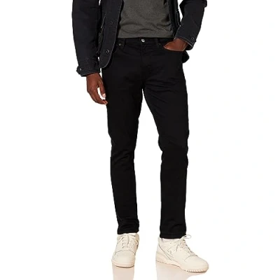 Immagine di Amazon Essentials Jeans Elasticizzati Skinny Uomo, Nero, 36W / 31L