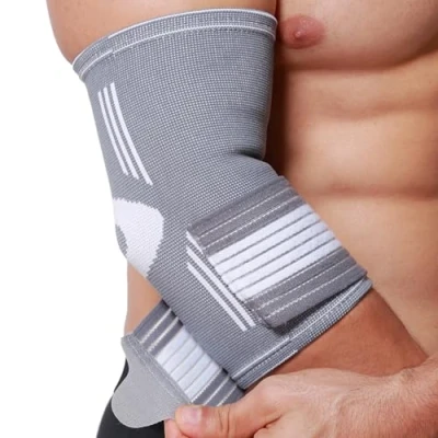 Immagine di NEOtech Care Tutore per gomito a fascia Tessuto elastico e traspirante compressione regolabile con uomo, donna, ragazzo braccio destro o sinistro (S, 1 Pezzo)