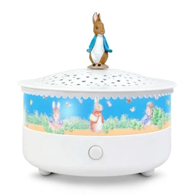 Immagine di Trousselier Luce notturna Proiettore di stelle pietra coniglio © 14 cm Musical Rilevamento del Pianto Ricaricabile USB
