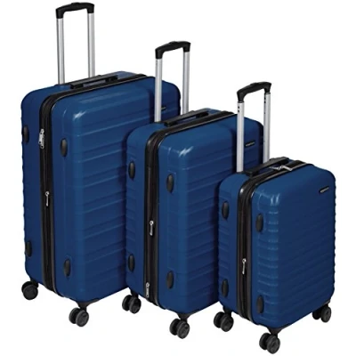 Immagine di Amazon Basics Set di 3 Pezzi trolley rigidi con rotelle girevoli, 55, 68, 78 cm, Blu Marino