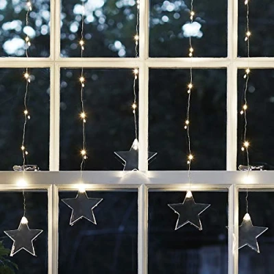 Immagine di Lights4fun Tenda di 47 Micro LED Bianco Caldo per Interni su Cavo Metallico con Stelle