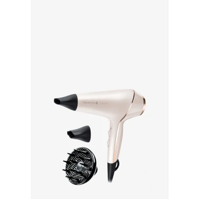 Immagine di Remington Asciugacapelli Professionale 2400W Teconologia OPTIheat per risultati di lunga durata 3 accessori styling, cura ionica, Anti crespo, Motore PROluxe AC9140