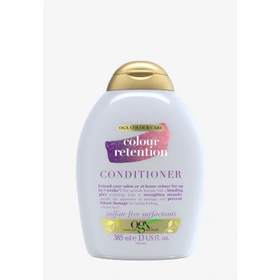 Immagine di OGX Balsamo Nouirishing + Coconut Milk, capelli secchi con Latte e Olio di Cocco, per un risultato morbido, luminoso sano, 385 ml