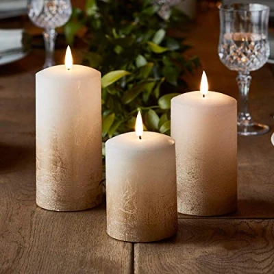 Immagine di Lights4fun TruGlow® Set di 3 Candele LED a Pile in Cera Bianca con Effetto Ombré Bronzo Stoppino e Fiamma Realistica
