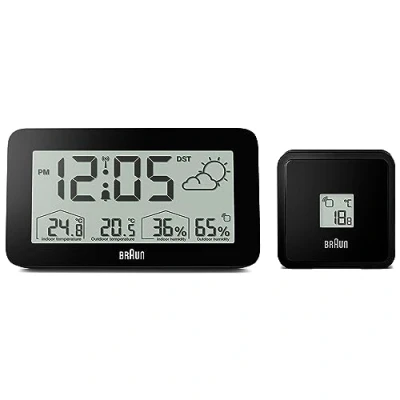 Immagine di Orologio digitale radiocontrollato con stazione meteo Braun per il fuso orario dell&#039;Europa centrale (DCF) temperatura e umidità, previsioni, allarme acustico in aumento, nero, modello BC13BP DCF.