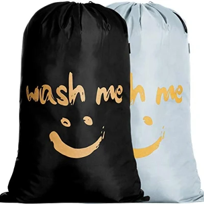 Immagine di IHOMAGIC 2Pack Sacchi da Biancheria, Grandi Sacchetto di Lavaggio Coulisse Pieghevoli Borsa Lavanderia Viaggio Cesta Biancheria Sacco Corda Sorridente d&#039;oro per Camera Apartamento, Argento/Nero
