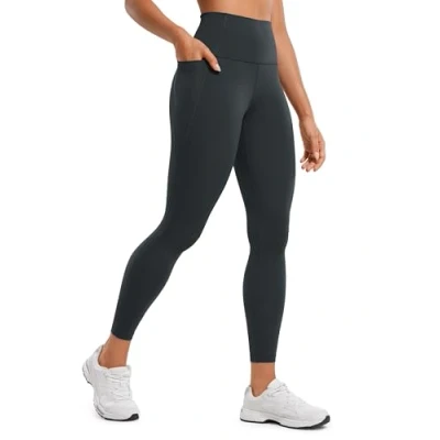 Immagine di CRZ YOGA Donne Butterluxe Allenamento Ghette 64cm A Vita Alta Leggings con Tasche Buttery Soft Melanite 42