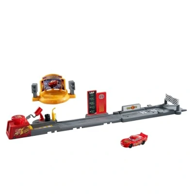 Immagine di Mattel CARS Pista di Lancio Piston Cup, set lungo 50+ cm con salti, acrobazie e 2 modalità gioco, veicolo Saetta McQueen incluso, giocattolo per bambini, 4+ anni, JDJ02