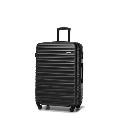 Immagine di WITTCHEN valigia da viaggio grande trolley check in guscio rigido ABS con 4 ruote piroettanti chiusura a combinazione maniglia telescopica Groove Line nero
