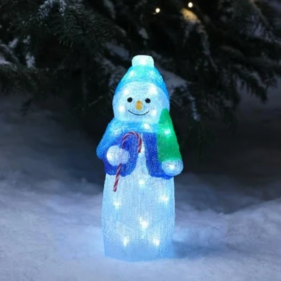 Immagine di Lights4fun Pupazzo di Neve Luminoso a Pile da 34 cm con 30 LED Bianco e Timer Figura Natale in Acrilico Decorazione Natalizia per Interni ed Esterni