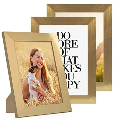 Immagine di PHOTOLINI cornici 13x18 cm oro legno MDF, set di 3 larghe, moderne, plexiglass infrangibile, da tavolo o parete, accessori extra per una parete dal look raffinato