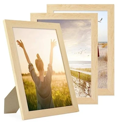 Immagine di PHOTOLINI cornici A4 21x30 cm legno MDF naturale, set di 3 larghe, moderne, plexiglass infrangibile, da tavolo o parete, accessori extra per una parete dal look raffinato