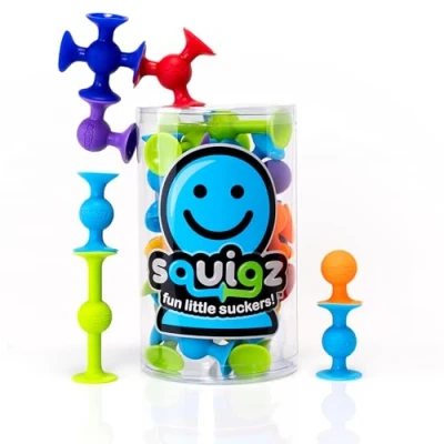 Immagine di Fat Brain Toys Squigz Starter Set 22 pezzi, costruzioni a ventosa, colorate in silicone alimentare, di diverse forme, sviluppano creatività e ingegno, adatto dai 36 mesi
