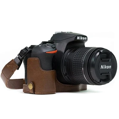 Immagine di Megagear Nikon D5600, D5500 Ever Ready Custodia Metà Copertura In Finta Pelle Per Fotocamera Con Tracolla Marrone Scuro Mg1171