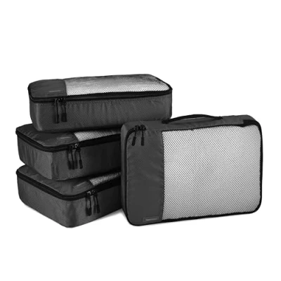 Immagine di Amazon Basics Organizer da Viaggio Salvaspazio per Valigie, con Cerniera, Set 4 Pezzi, Medio, Nero