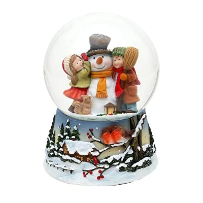 Immagine di Dekohelden24 Palla di neve con pupazzo bambini su base finemente decorata, meccanismo gioco, melodia: calma della neve, dimensioni (L x P A): 10,5 14,cm sfera Ø cm., 501863, 14 cm