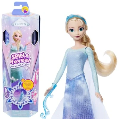 Immagine di Mattel Disney Frozen Elsa Spin &amp; Reveal, bambola ispirata al film con 11 sorprese incluse tra cui 5 accessori, adesivi e una scena di gioco, giocattolo per bambini, 3+ anni, JBG59