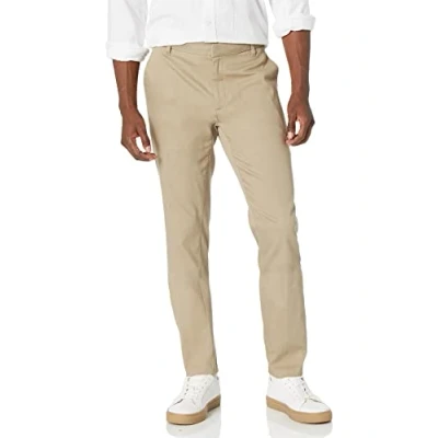 Immagine di Amazon Essentials Pantaloni Chino Aderenti Elasticizzati con Parte Piatta sul Davanti Resistenti alle Pieghe Uomo, Tan, 34W / 33L
