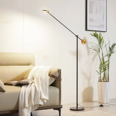 Immagine di Lucande Piantana LED Adomas, nero/oro, ferro, dimmerabile