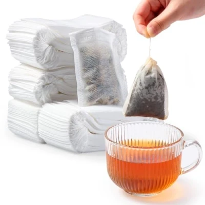 Immagine di Diboniur 400 Pezzi Bustine Te Vuote in Tessuto Non Tessuto, Infusore per Tisane Usa e Getta, Filtro Infusione con Coulisse Tè, Tè ai Fiori, Caffè, Spezie (7x9cm)