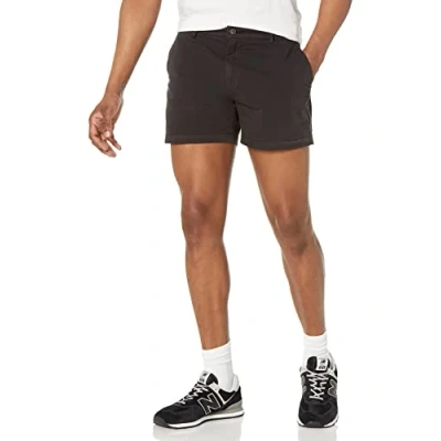 Immagine di Amazon Essentials Pantaloncini Chino Elasticizzati Comodi Senza Pinces 13 cm Slim (in precedenza Goodthreads) Uomo, Nero, 32W