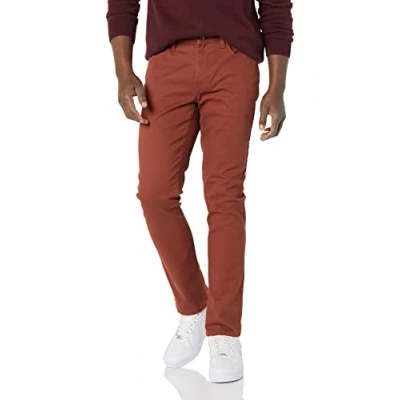 Immagine di Amazon Essentials Pantaloni in Twill Elasticizzati con 5 Tasche Slim Uomo, Ruggine, 34W / 30L