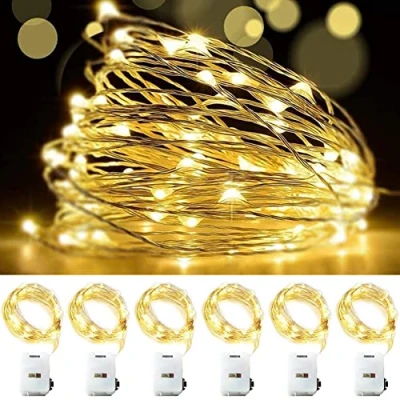 Immagine di LED Stringa Luci a Batteria, 6 Pezzi 3 Metri 30LED Modalità Rame Filo Ghirlanda Catena Luminose Lucine Fata per Natale Matrimonio Decorative Festa Interno Natalizie letto Camera, Bianco Caldo