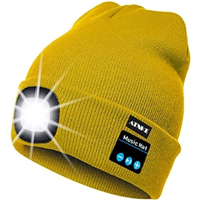 Immagine di ATNKE Berretto Bluetooth con LED Illuminato, USB Ricaricabile Wireless Musicale Cappello da Corsa Ultra Bright 4 Impermeabile Lampada Uso per Sci Escursionismo Campeggio Ciclismo (Giallo)