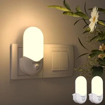 Immagine di STANBOW Luce Notturna Bambini, 2 Pezzi Luci Notturne con Sensore di Luce, da Presa per Camera dei Bagno, Corridoio, Cucina, Scale, Bianca Calda