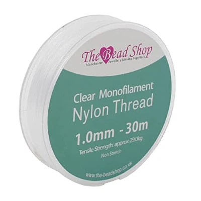 Immagine di The Bead Shop filo invisibile in nylon trasparente da 1 mm, cucito trasparente, per decorazioni appendere, non elasticizzato, resistenza alla trazione circa 29 kg (bobina mm 30 m)