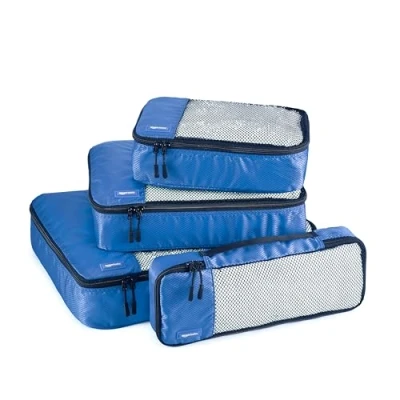 Immagine di Amazon Basics Organizer da Viaggio Salvaspazio per Valigie, con Cerniera, Set 4 Pezzi, Grande/Medio/Piccolo/Sottile, Blu
