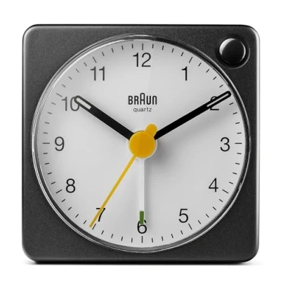 Immagine di Braun Classic Travel Analogue Alarm Clock with Snooze And Light, Compact Size, Quiet Quartz Movement, Crescendo Beep in Black White, Model BC02XBW.