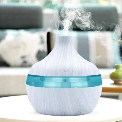 Immagine di EHOTER Diffusore di oli essenziali,300 ml,umidificatori per camera da letto,con luce LED in 7 colori,mini umidificatore essenziali,diffusore aromaterapia,diffusore aromi,nebbia fredda,