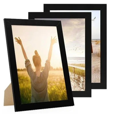 Immagine di PHOTOLINI cornici A4 21x30 cm nero legno MDF, set di 3 larghe, moderne, plexiglass infrangibile, da tavolo o parete, accessori extra per una parete dal look raffinato