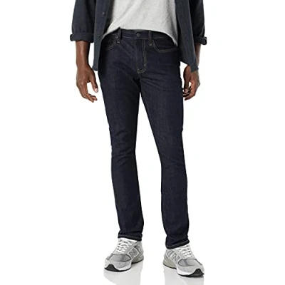 Immagine di Amazon Essentials Jeans Elasticizzati a Vita Alta vestibilità Attillata Uomo, Slavato, 31W / 32L