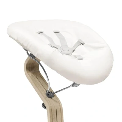 Immagine di Newborn set Stokke Nomi, Grey/Grey Sand Include una cintura di sicurezza a 5 punti e un tessuti reversibili lavabili Compatibile con tutte le sedie Nomi