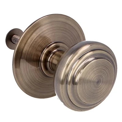 Immagine di Amig Pomello mod. 15 in ottone massiccio intagliato con finitura pelle per porte esterne di ingresso Diametro maniglia Ø70 mm · Altezza 77 Include vite e dado fissaggio