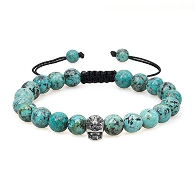 Immagine di COAI Bracciale Unisex Regolabile con Perle in Turchese Africano e Amuleto Teschio