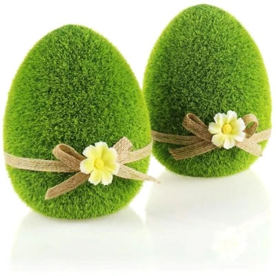 Immagine di com four® 2X Figure Decorative Uovo di Pasqua con Fiocco e Fiori Verdi per la Primavera Uova in Ceramica ricoperte Erba Artificiale (2 15 cm)