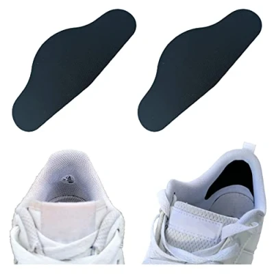Immagine di Trainer Armour Tallone Preventer per scarpe e stivali. Toppe autoadesive nere stile &quot;avvolgente&quot; estremamente resistenti prevenire riparare i fori del tallone.