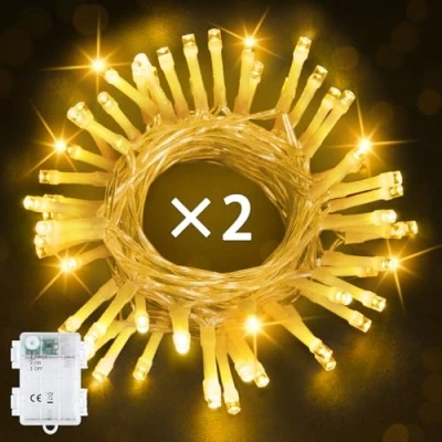 Immagine di Bowfar Catena luminosa per esterni, 5 m, 50 LED, luce bianca calda, con timer da 6 ore, IP65, impermeabile, interni, feste, Natale, attività all&#039;aperto (2 pezzi, cavo trasparente)
