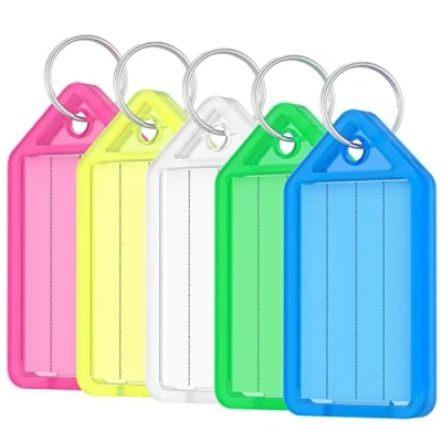 Immagine di Uniclife 20 Pezzi Targhette Portachiavi Scrivibile 5 cm Plastica con Etichette in Carta Bianca Coperture Trasparenti e Anelli Spaccati Robusti Identificatori di Articoli, Colori
