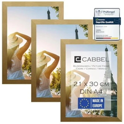Immagine di CABBEL Confezione da Tre (3 Pezzi) cornici DIN A4 21x30 in Legno MDF Color Oro con Vetro plexi infrangibile