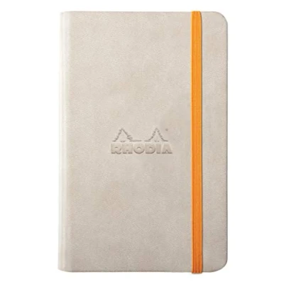 Immagine di RHODIA 118625C Taccuino Rigido Beige A6 192 pagine Carta Clairefontaine Uni Avorio 90 g/m Segna pagina, Chiusura con elastico Copertina Simil Cuoio Collezione Rhodiarama