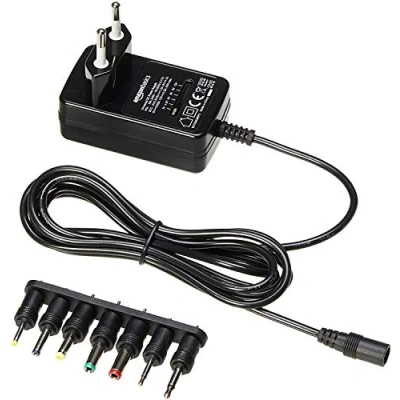 Immagine di Amazon Basics Alimentatore universale con 7 spine rimovibili, 3 12 V (tensione DC), polarità reversibile, nero