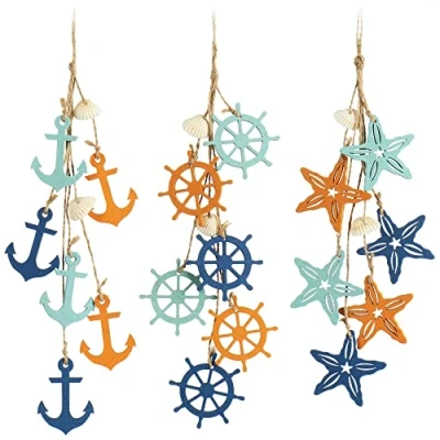 Immagine di com four® 3X Decorazione da Appendere Marittima Stella Marina, Ancora e timone in Legno con Conchiglie Stile Mare (3 Pezzi 38 cm)