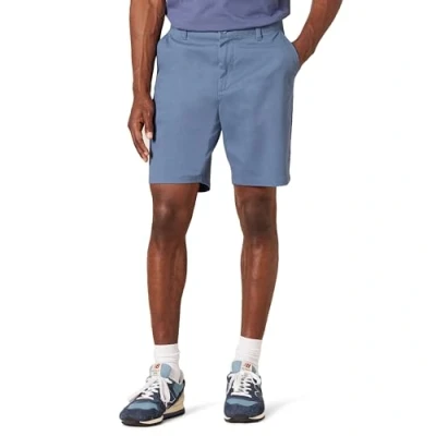 Immagine di Amazon Essentials Pantaloncini Chino Elasticizzati e Aderenti da 23 cm Uomo, Blu Scuro, 31W